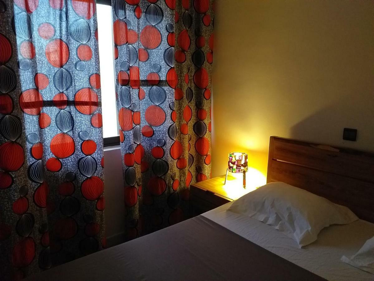 Karls Guesthouse Котону Экстерьер фото